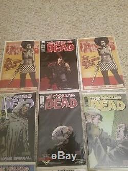 The Walking Dead #1 CGC 9.8 with Negan #100 and Michone #101 (2)Ghost Variants